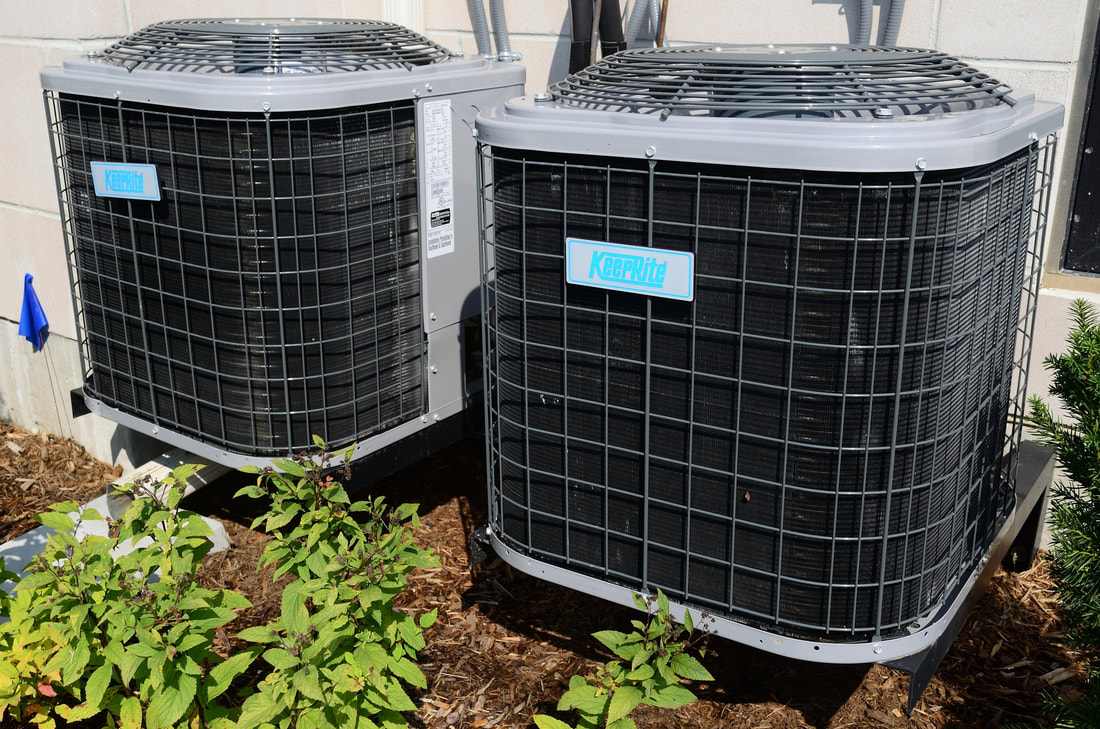 Picture of two outdoor AC units